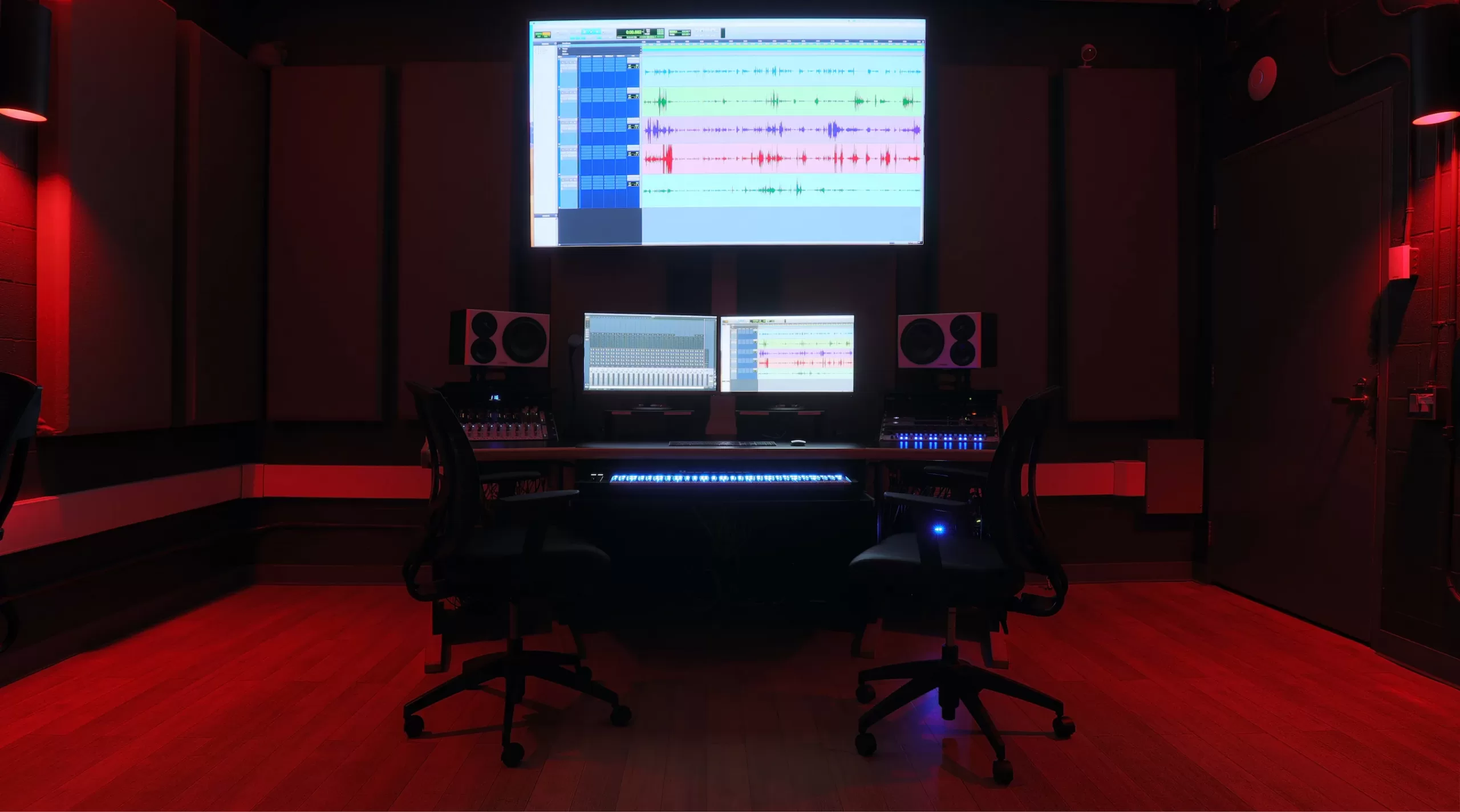 audio control room with red lights